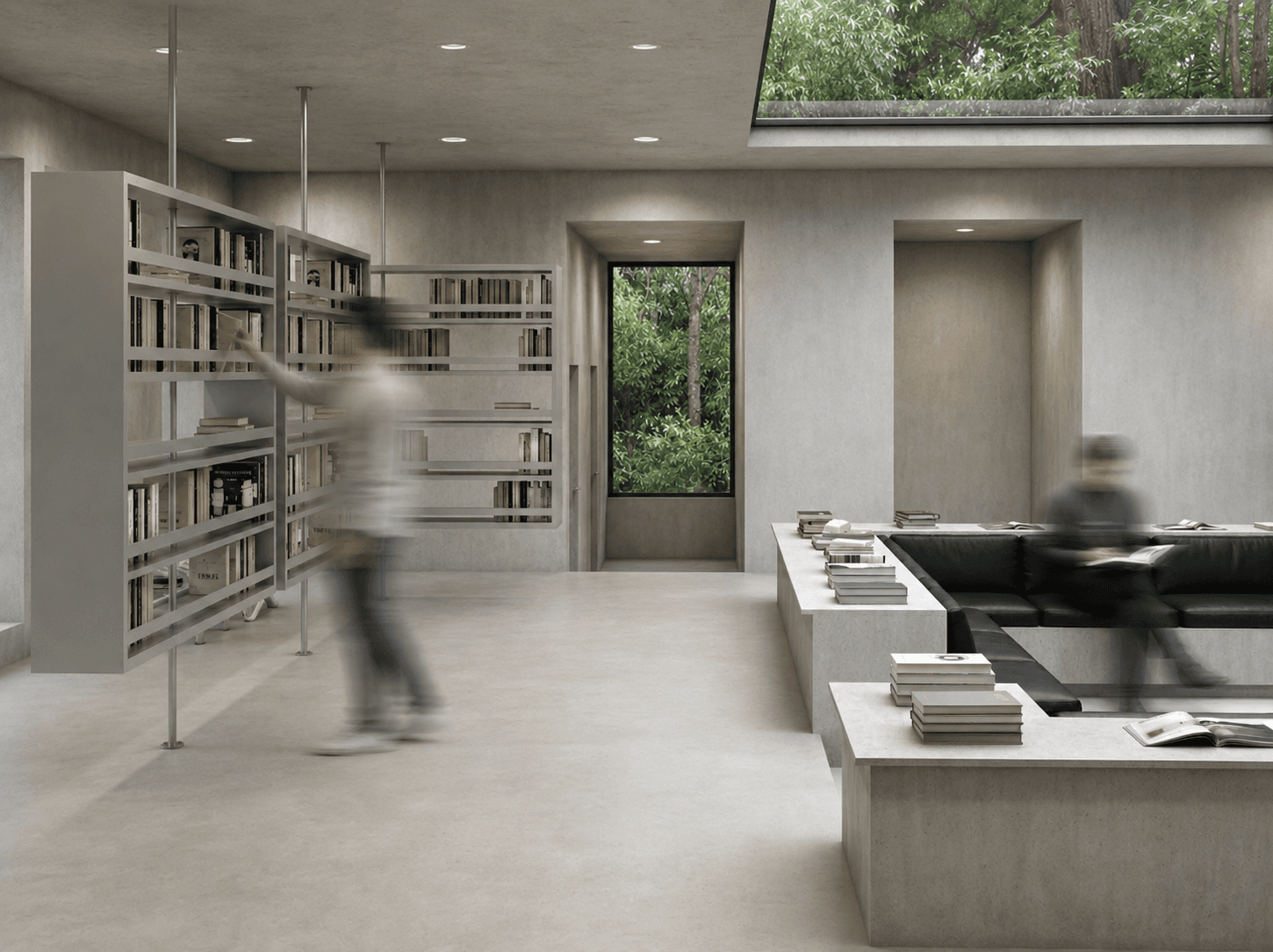 A visitor reaching into a tall bookshelf beside a narrow forest window, a second sunken sofa area visible beyond.