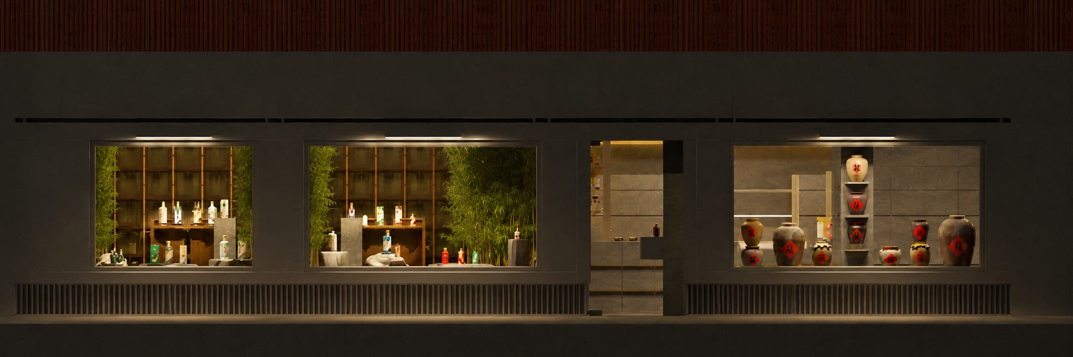 The same Brera frontage at night, each display window lit from within.